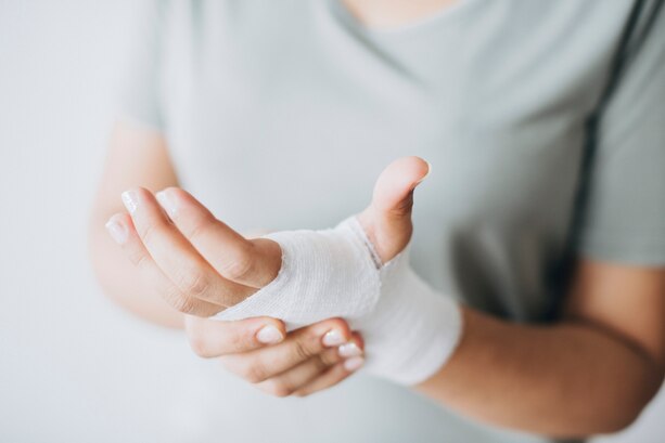 woman with bandages on hands after personal injury in palms california